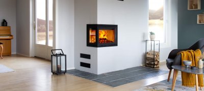 Jøtul I 520 FL fireplace insert in white wall in Scandinavian interior
