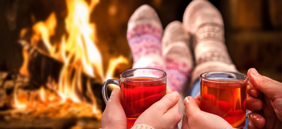 Cozy in front of the fireplace. Photo.