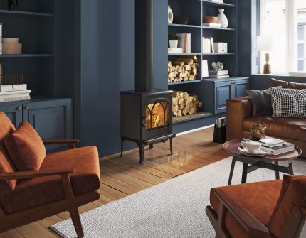 Jøtul F 200 black and small wood burning stove in a dark blue living room