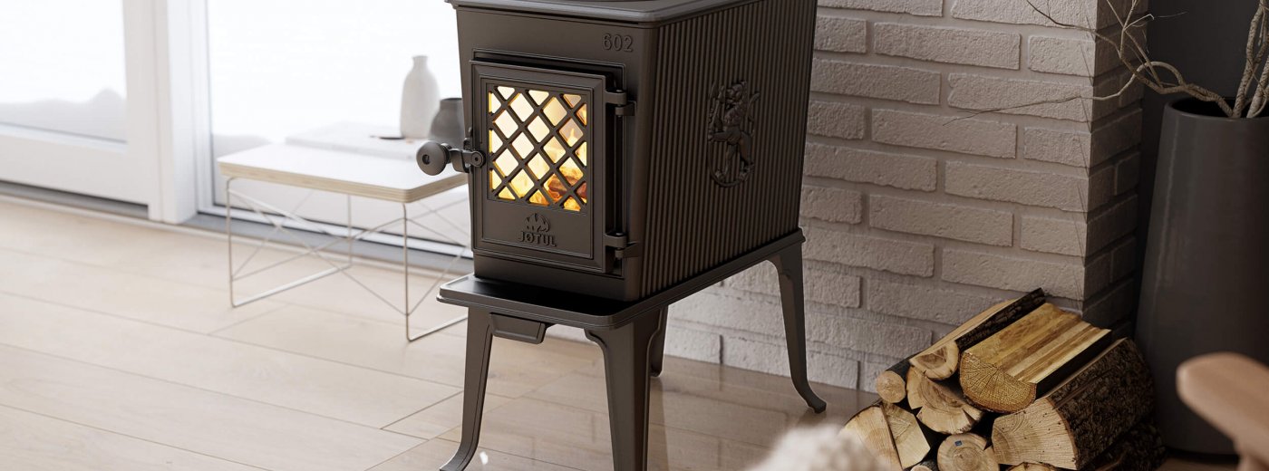 Jøtul F 602 ECO small wood stove with hob in modern living room