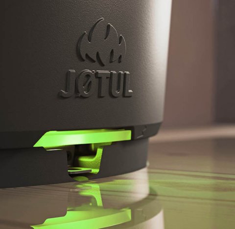 Detail: Black stove with green Zensoric air system light signal